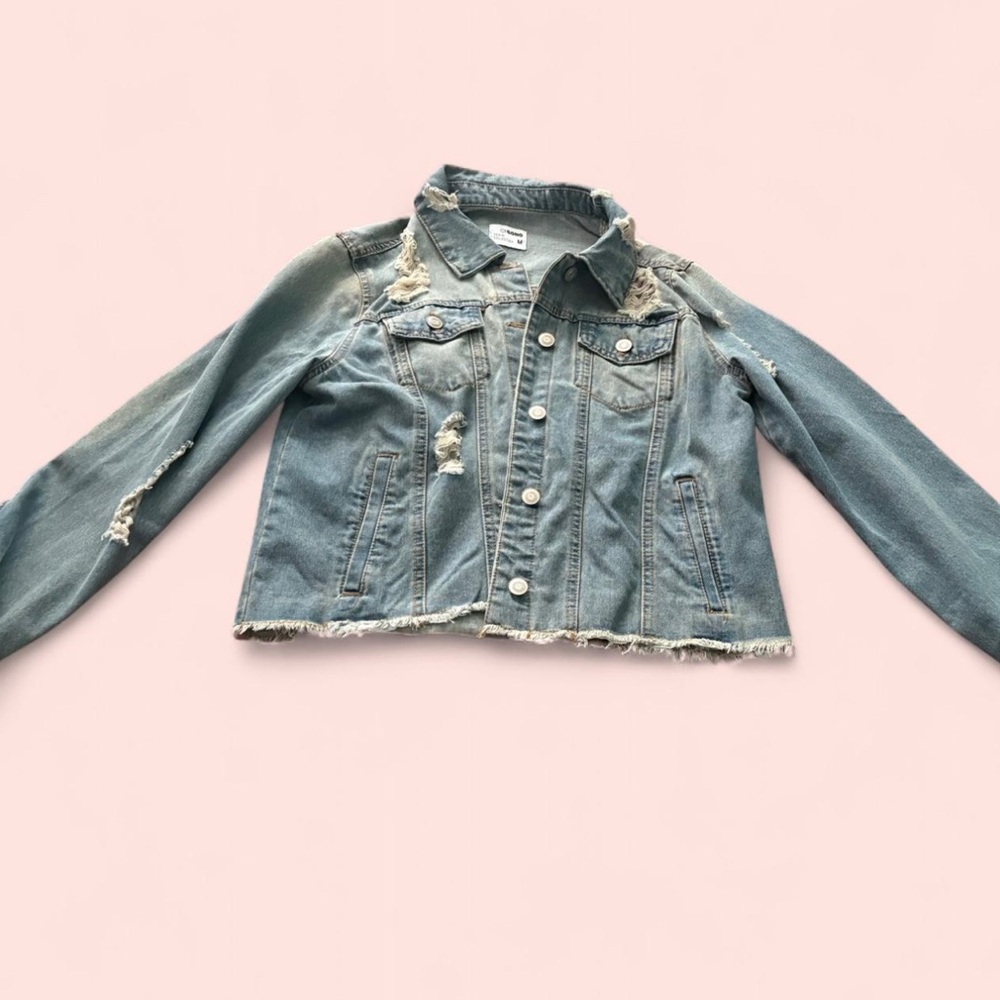 Distressed denim jacket